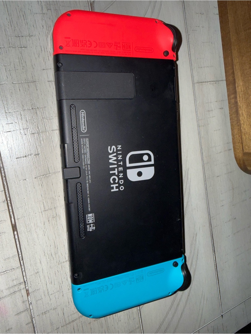 Nintendo Switch with Neon Blue (left) & Neon Red (right) Joy‑Con - Picture 2 of 5